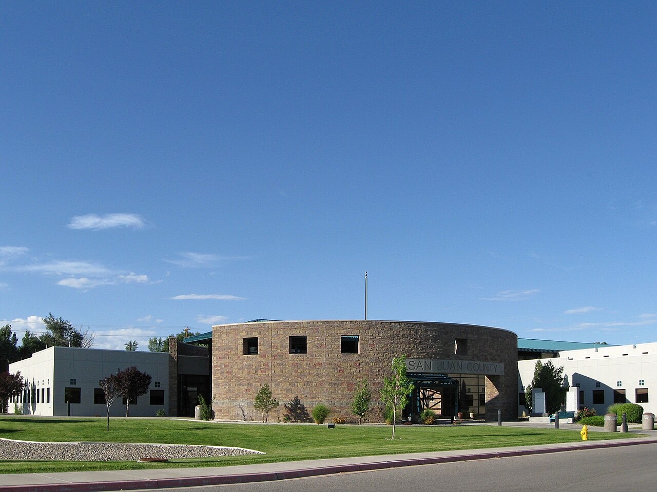 File photo: File photo: San Juan County Administration Building in Aztec, New Mexico. Illustrative context; not a photograph of the reported event.