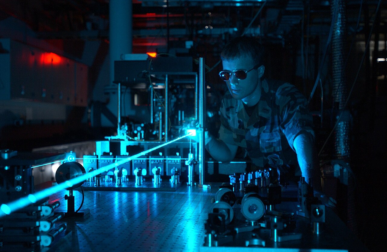 File photo of a U.S. Air Force laser experiment. Illustrative laboratory context; not a photograph of the reported experiment, weapon or results.